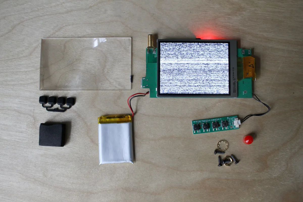 Electrical components of the headset laid out on a table.