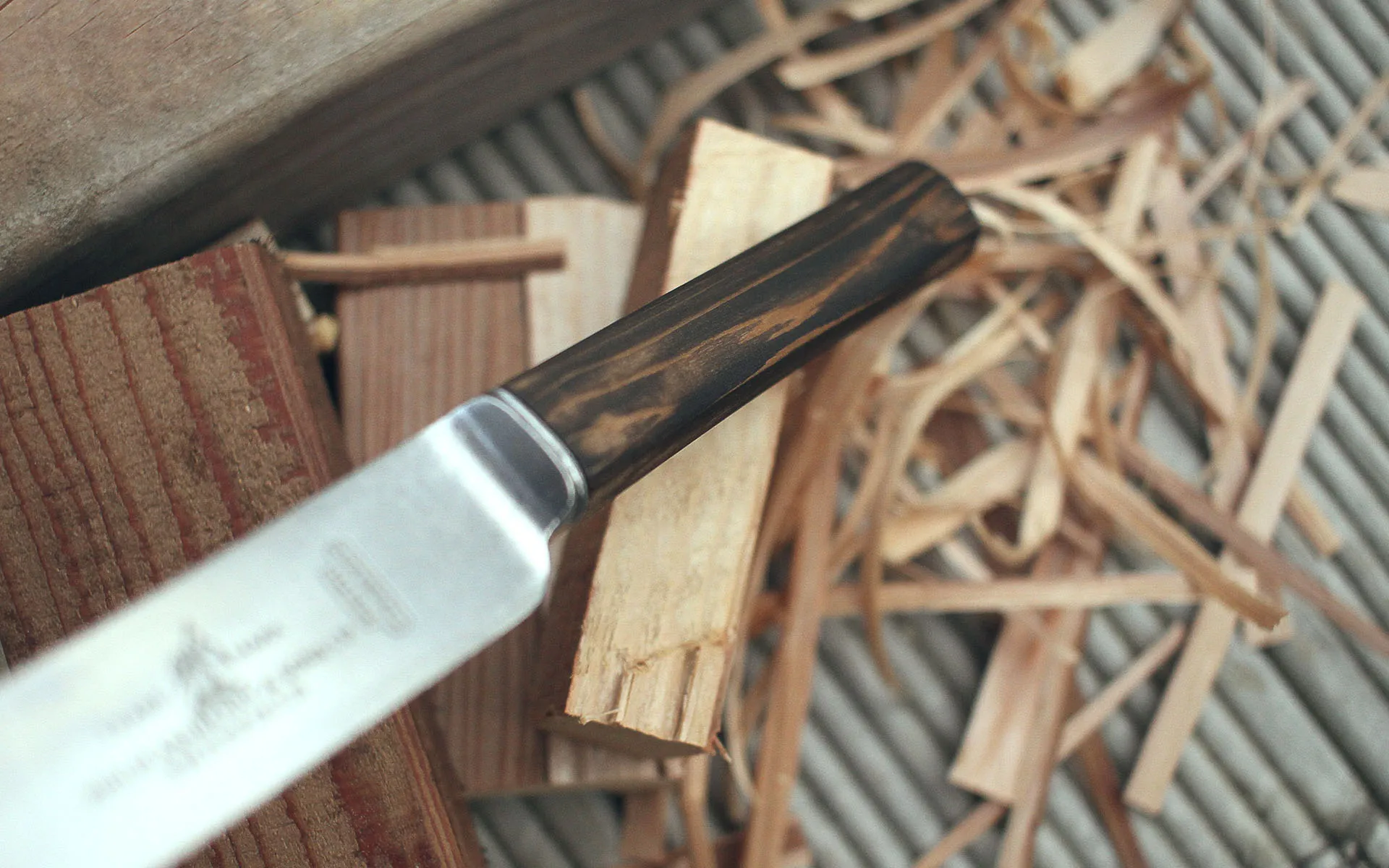 Closeup of a stain finish of the new knife handle.